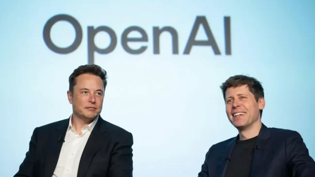 Elon Musk and Sam Altman at an OpenAI event, seated in front of the OpenAI logo.