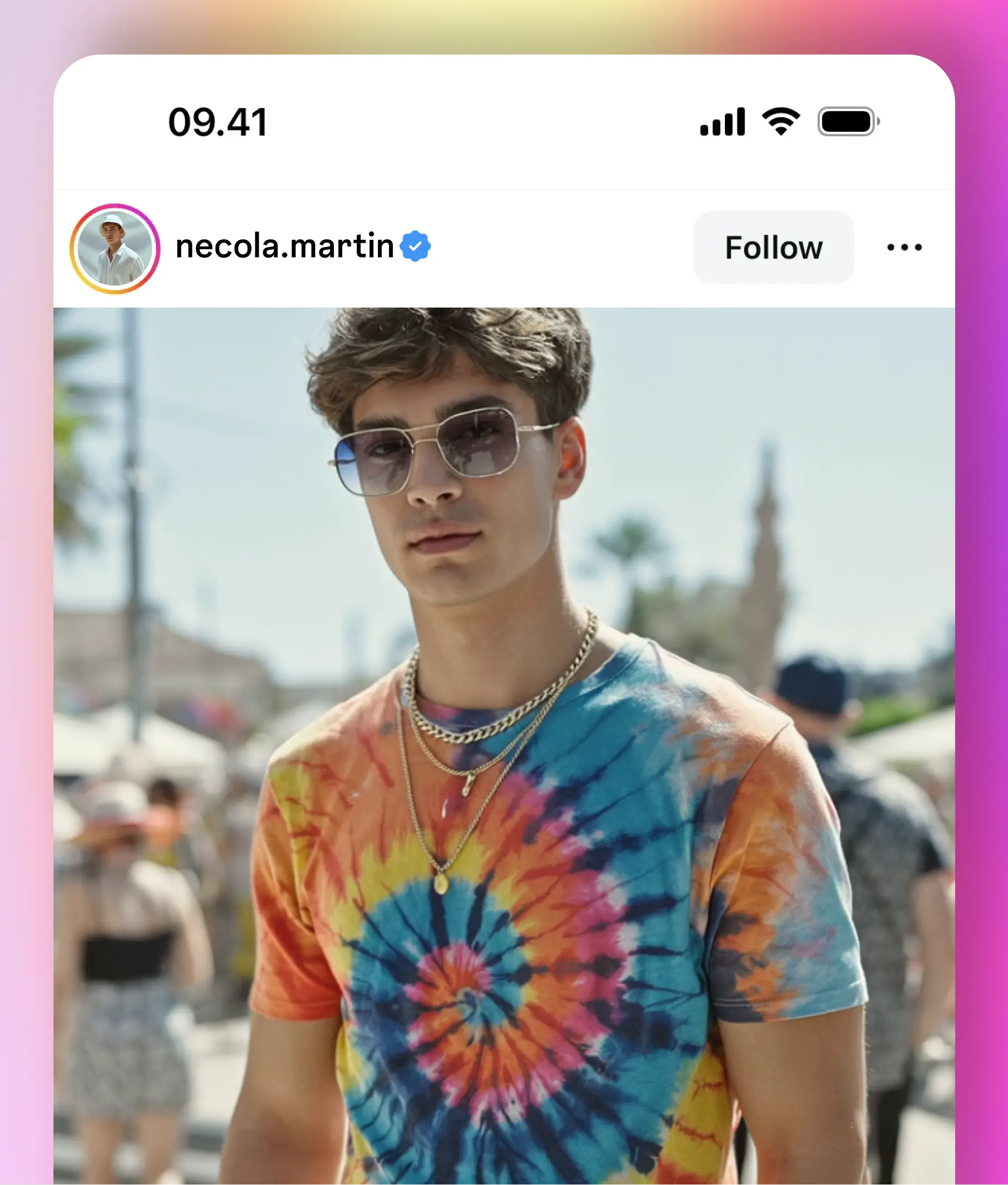 Instagram lifestyle image of a young man in a tie-dye t-shirt and sunglasses posing in a trendy outdoor street scene.
